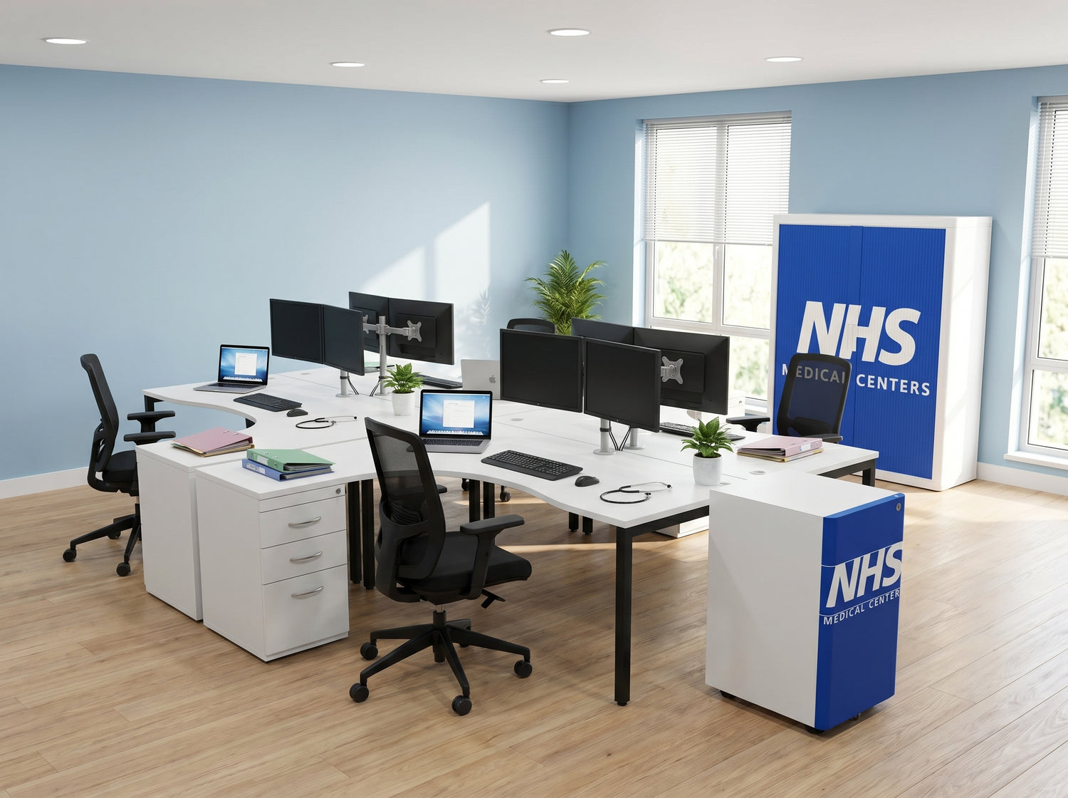 Modern office setup with desks, chairs, and NHS branded partitions.