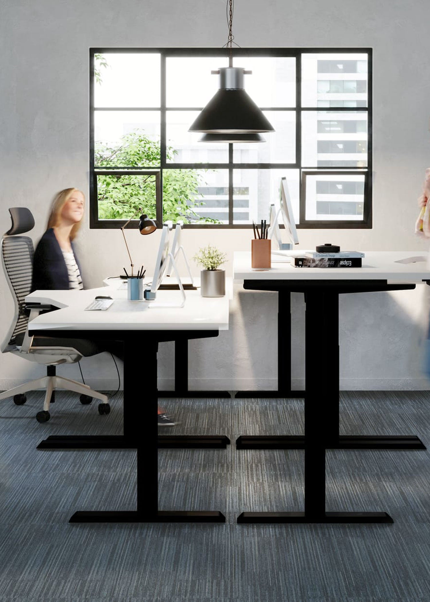 Modern office setup with  height adjustable desks office chair