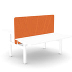 A modern white table with a white metal frame and a prominent orange upholstered backrest panel, shown on a clean white background.