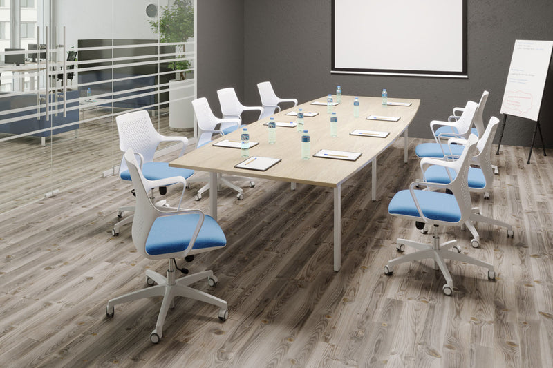 Modern office meeting table or conference room with a long table and chairs on a wooden floor.