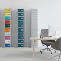 Three tall lockers with colored doors on a white background