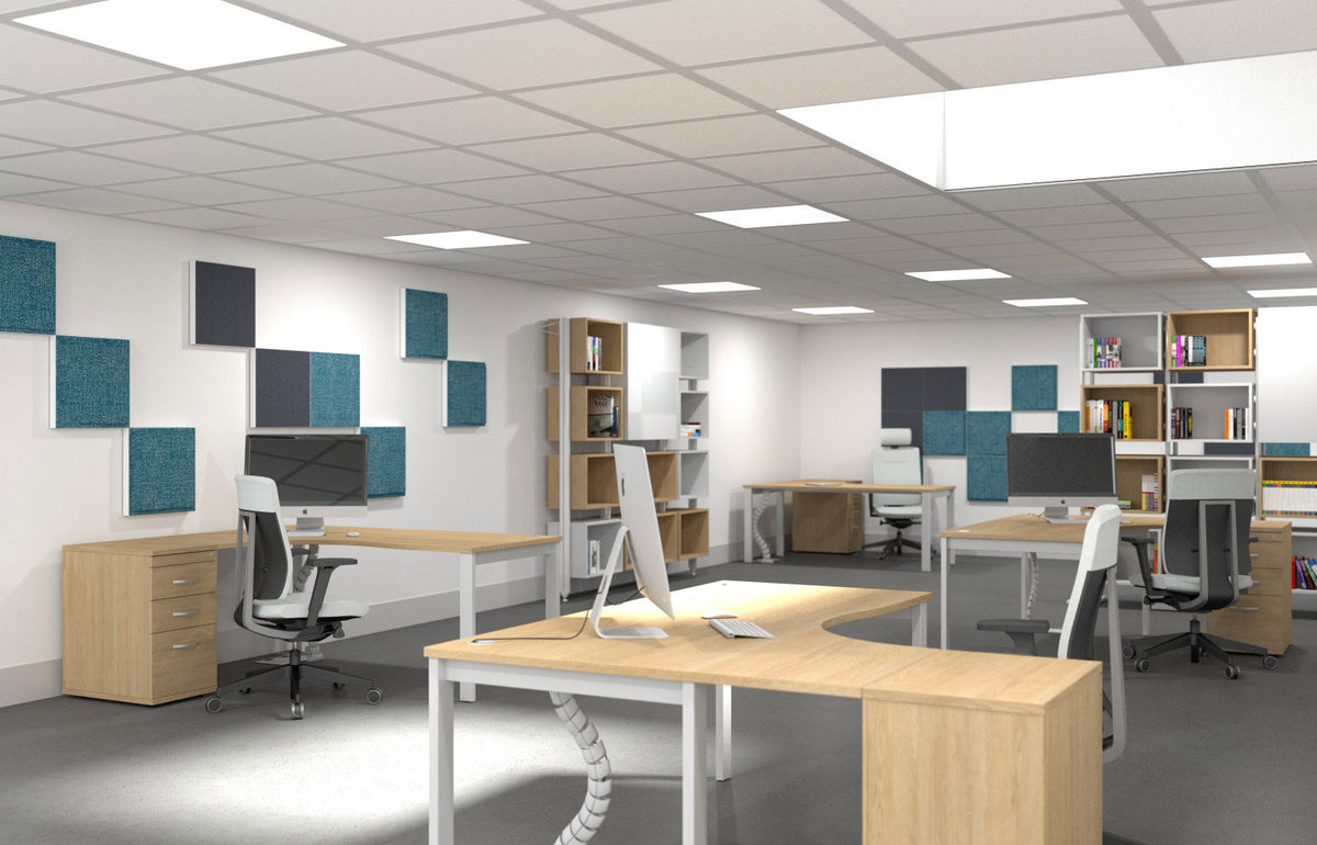 Modern office space with desks, chairs, and wall-mounted monitors.