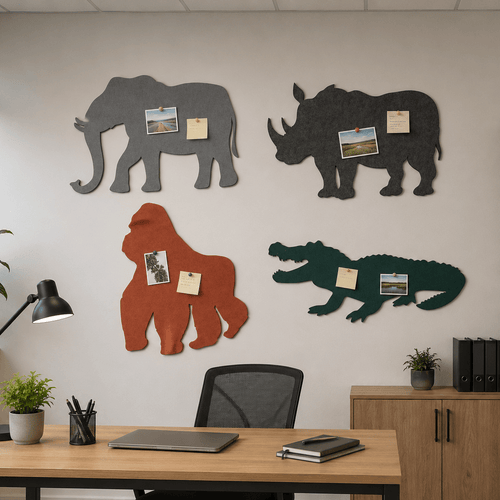 Decorative animal-shaped bulletin boards on a wall above a desk.
