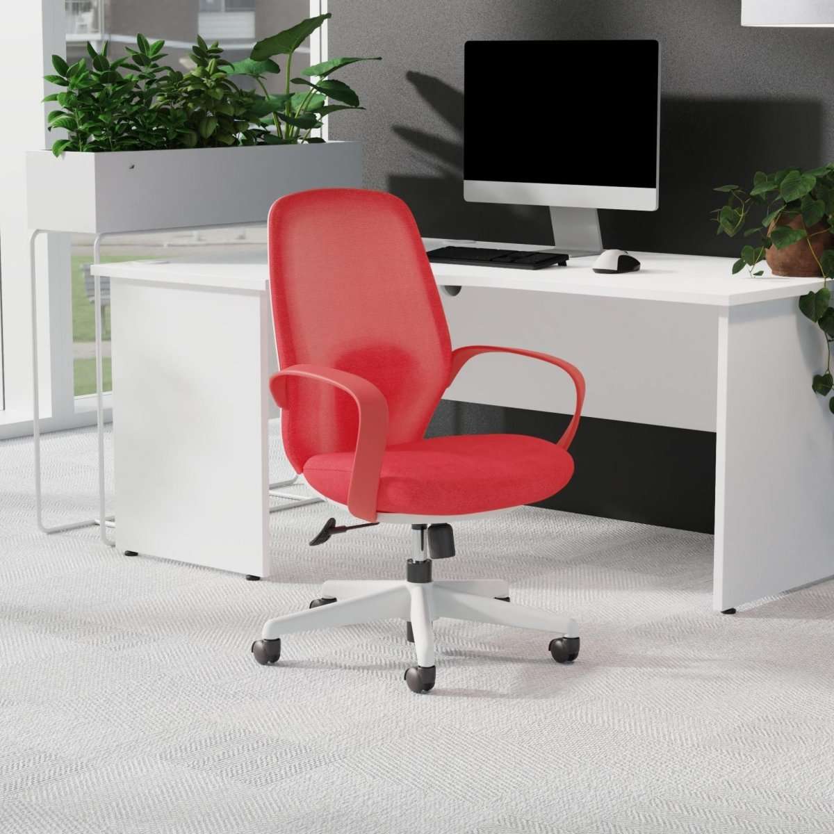Red mesh back office chair with fixed arms in an office setting