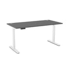 A modern standing desk with a dark gray rectangular top and white metal legs, shown on a plain white background.