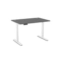 An adjustable height standing desk with a dark gray rectangular top and white metal legs, shown on a plain white background.