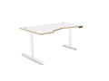 An L-shaped standing desk with a white top and light wood grain edges, supported by a white metal T-style base, shown on a solid white background.