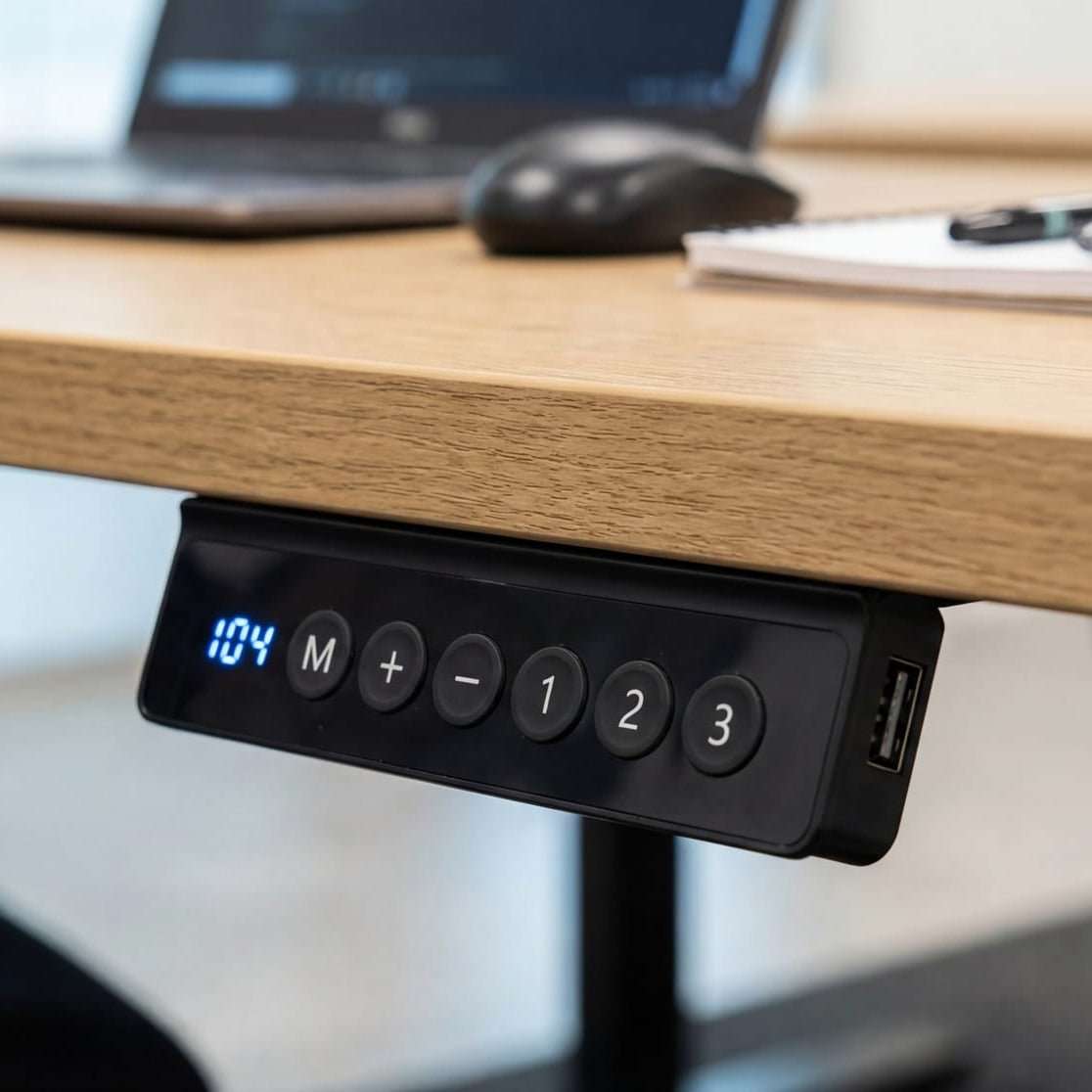 Close-up of digital control panel on a height adjustable desk