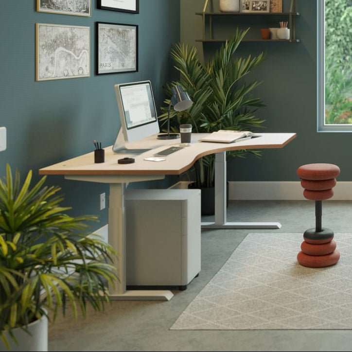 Modern home office with a desk, chairs, and decorative elements.