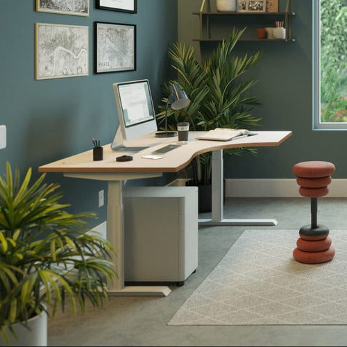 Modern home office with a desk, chairs, and decorative elements.