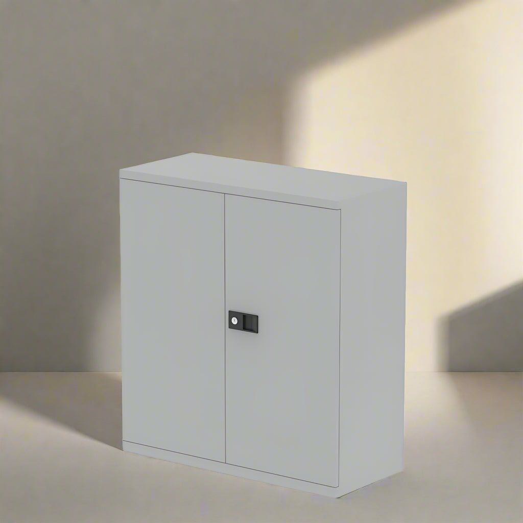 Gray storage cabinet with a black handle on a white background