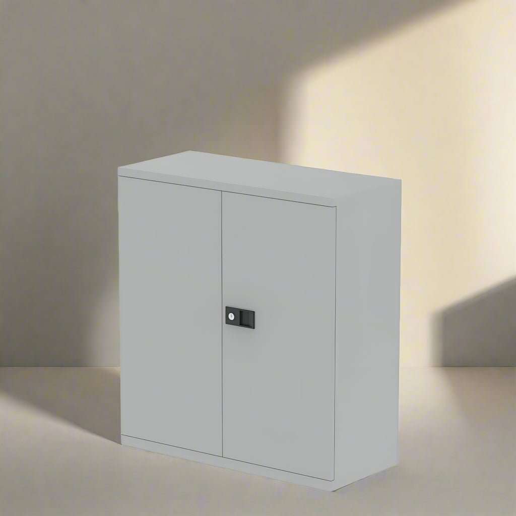 Gray storage cabinet with a black handle on a white background