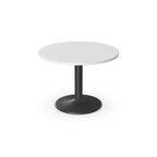 Round table with white top and black base on a white background