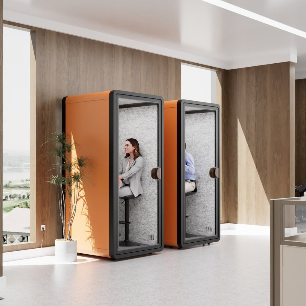Modern office space with privacy pods and a reception area. Phone Booth for Office Affordable Acoustic  POD TMOMDP114