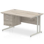 Office furniture impulse-cantilever-straight-desk-silver-frame-with-fixed-pedestal Dynamic  Grey Oak 140 Wide 2 Drawer